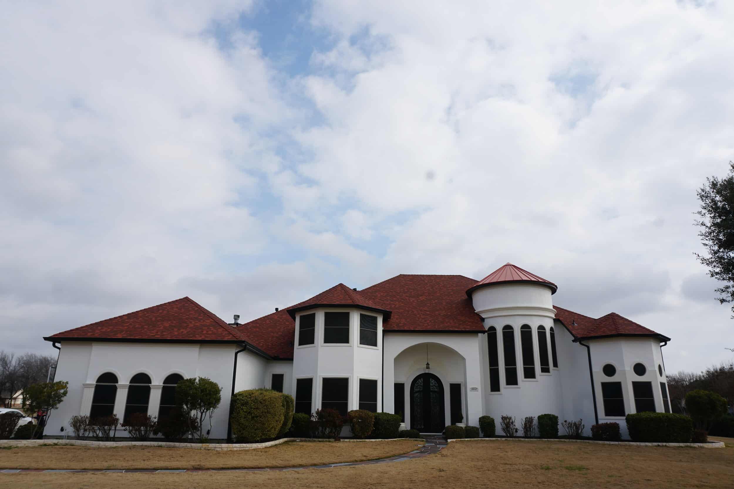 large home with red roof